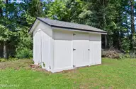 111 Pirates Lane, Havelock, NC 28532 — 4-bedroom home in College Park, Havelock, NC, photo 24 of 25: 111 Pirates Ln. Shed