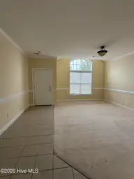 2060 Cambria Drive A, Greenville, NC 27834 — 3-bedroom townhome in Brook Hollow, Greenville, NC, photo 2 of 10: Living room - Front Door