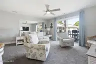 908 Resort Circle Unit 510, Sunset Beach, NC 28468 — 1-bedroom condo in Colony II, Sunset Beach, NC, photo 10 of 30: Pull out couch