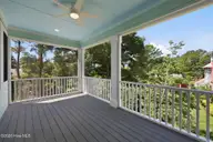 309 Shipwreck Lane, Emerald Isle, NC 28594 — 4-bedroom home in Spinnakers Reach, Emerald Isle, NC, photo 16 of 45: Screened in Porch