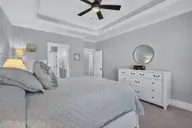8110 Manassas Lake Lane, Leland, NC 28451 — 3-bedroom home in Brunswick Forest, Leland, NC, photo 21 of 69: Primary Bedroom