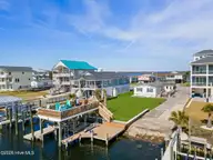 9105 W 9th Street, Surf City, NC 28445 — 3-bedroom waterfront manufactured home in Old Settlers Beach, Surf City, NC, photo 2 of 60: Primary