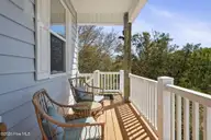308 Live Oak Street, Emerald Isle, NC 28594 — 4-bedroom waterfront home in Ocean Forest, Emerald Isle, NC, photo 4 of 68: Front Deck