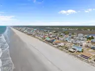 1717 W Beach Drive, Oak Island, NC 28465 — 4-bedroom waterfront home, Oak Island, NC, photo 9 of 60: 11-web-or-mls-DJI_20260416120017_0901_D