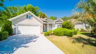 279 Ravennaside Drive NW, Calabash, NC 28467 — 3-bedroom home in Brunswick Plantation, Calabash, NC, photo 1 of 48