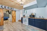 141 Pender Lane, Newport, NC 28570 — 3-bedroom manufactured home, Newport, NC, photo 23 of 36: Downstairs Studio - Kitchen