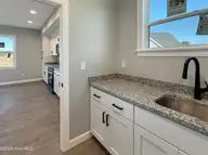 1061 Staysail Drive, Elizabeth City, NC 27909 — 4-bedroom home in Tooley Harbor, Elizabeth City, NC, photo 11 of 30: Butler's Pantry