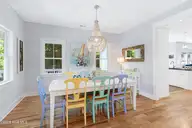 121 Sea Isle North Drive & Slip 20, Indian Beach, NC 28512 — 3-bedroom waterfront home in Sea Isle Plantation North, Indian Beach, NC, photo 12 of 53: Formal dining