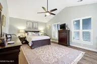 503 W Yacht Drive, Oak Island, NC 28465 — 4-bedroom home in Tranquil Harbor, Oak Island, NC, photo 16 of 53: Primary bedroom 1