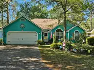 11 Court 5 Northwest Drive, Carolina Shores, NC 28467 — 3-bedroom home in Carolina Shores, Carolina Shores, NC, photo 1 of 26: Front view