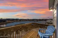 113 Anchor Drive A, Surf City, NC 28445 — 5-bedroom waterfront townhome in Topsail Cove, Surf City, NC, photo 5 of 62: 4-web-or-mls-Virtual Dusk 4_2
