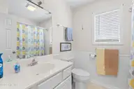 101 SE 24th Street, Oak Island, NC 28465 — 4-bedroom home, Oak Island, NC, photo 18 of 73: 101SE24thSt - 40
