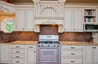 2525 Highway 58, Swansboro, NC 28584 — 3-bedroom waterfront home, Swansboro, NC, photo 15 of 69: Gas stove