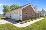 200 E Howard Drive, Jacksonville, NC 28540 — 4-bedroom home in River Bluff, Jacksonville, NC, photo 6 of 55: Garage exterior