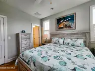 111 Blockade Runner Drive, Holden Beach, NC 28462 — 4-bedroom home, Holden Beach, NC, photo 17 of 54: Primary Suite Upstairs