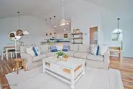 101 Shipwreck Lane E, Emerald Isle, NC 28594 — 3-bedroom waterfront townhome in Spinnakers Reach, Emerald Isle, NC, photo 7 of 38: Living Room