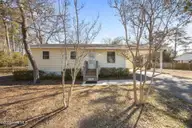 130 NW 25th Street, Oak Island, NC 28465 — 2-bedroom home in Pinners Point, Oak Island, NC, photo 1 of 44: 1-web-or-mls-IMG_5715