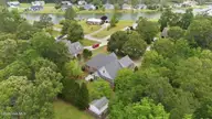 132 42 Quail Woods Drive, New Bern, NC 28560 — lot in Quail Woods Village, Ltd, New Bern, NC, photo 3 of 6: 7-web-or-mls-DJI_20260511130123_0360_D