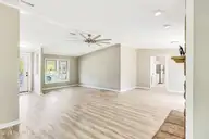 1660 White Duck Court SW, Supply, NC 28462 — 3-bedroom manufactured home in Wood Duck Retreat, Supply, NC, photo 9 of 28: Living and Dining Area