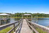 604 E Yacht Drive, Oak Island, NC 28465 — 3-bedroom waterfront home in Tranquil Harbor, Oak Island, NC, photo 6 of 78: 67-web-or-mls-CAMMediaLLC.com (73 of 80)