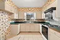 209 Brentwood Drive N, Wilson, NC 27893 — 4-bedroom home in Brentwood Forest, Wilson, NC, photo 17 of 60: Kitchen 3