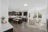 120 N Brig Drive, Hampstead, NC 28443 — 4-bedroom home in Saltwater Landing, Hampstead, NC, photo 20 of 46: 28_virtually staged kitchen breakfast no