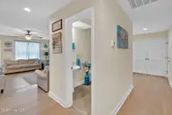 129 NE 13th Street, Oak Island, NC 28465 — 3-bedroom home, Oak Island, NC, photo 17 of 68: Downstairs 1/2 Bathroom