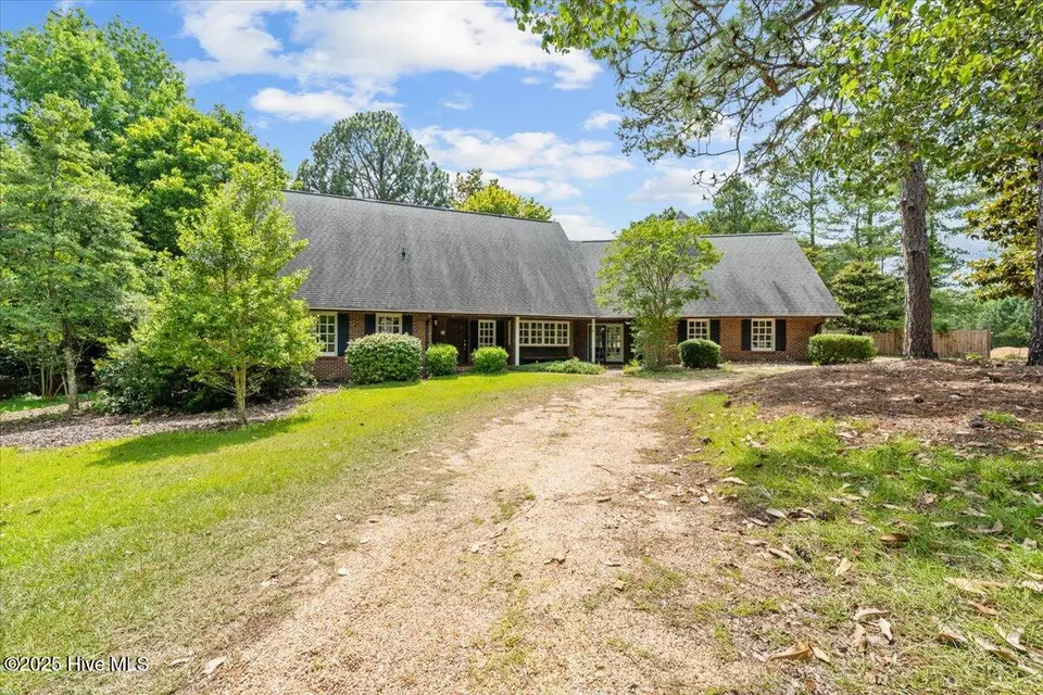 143 Shagbark Court, West End, NC 27376 — 5-bedroom home in Seven Lakes North, West End, NC, photo 1 of 66: 143 Shagbark Ct West End NC