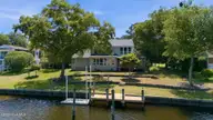 6106 Cardinal Drive, New Bern, NC 28560 — 3-bedroom waterfront home in Fairfield Harbour, New Bern, NC, photo 2 of 46: Gorgeous Waterfront Home