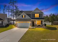466 Eden Drive SW, Supply, NC 28462 — 4-bedroom home in Ruffin's River Lndg, Supply, NC, photo 1 of 41: Front