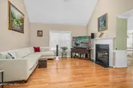3578 Spring Mill Trail Road, Rocky Mount, NC 27804 — 3-bedroom home in Old Carriage Farm, Rocky Mount, NC, photo 4 of 35: Spacious living room with fireplace