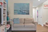 129 NE 13th Street, Oak Island, NC 28465 — 3-bedroom home, Oak Island, NC, photo 6 of 68: Living Room