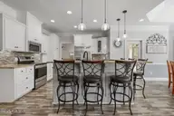 117 Oak Summit Drive, Pikeville, NC 27863 — 3-bedroom home in Oak Summit, Pikeville, NC, photo 11 of 59: 117 Oak Summit Dr Breakfast Bar