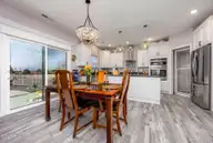 456 Pointe Vista Drive, Elizabeth City, NC 27909 — 4-bedroom waterfront home in The Waters At Sunset Pointe, Elizabeth City, NC, photo 14 of 49: 10-456 Pointe Vista - Dining Room-1