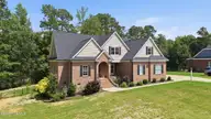 1453 Blue Heron Drive, Nashville, NC 27856 — 3-bedroom waterfront home in The Landing at Cooper Fields, Nashville, NC, photo 4 of 59: 3-web-or-mls-DJI_20260708152157_0580_D