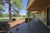 25 Lake Hills Road, Pinehurst, NC 28374 — 3-bedroom home in Unit 6, Pinehurst, NC, photo 17 of 26: Back Porch Outside Dining Room