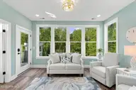 210 River Oats Court, Holly Ridge, NC 28445 — 4-bedroom waterfront home in Redd's Cove, Holly Ridge, NC, photo 23 of 69: 51_sitting room