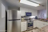 10300 Coast Guard Road E103, Emerald Isle, NC 28594 — 3-bedroom waterfront condo in Point Emerald Villas, Emerald Isle, NC, photo 11 of 47: Kitchen II