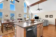 6707 Kings Lynn Drive, Oak Island, NC 28465 — 3-bedroom waterfront home in Kings Lynn, Oak Island, NC, photo 9 of 51: 6707 windows