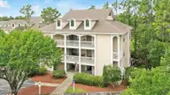 3350 Club Villas Drive # 105, Southport, NC 28461 — 2-bedroom condo in St James, Southport, NC, photo 1 of 78: 3350ClubVillasDriveUnit105Drone-1