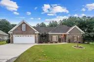 306 S Merganser Drive, Pikeville, NC 27863 — 3-bedroom home in Mallard Pointe, Pikeville, NC, photo 1 of 59: 01-306 S Merganser Dr-1