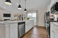 518 Heart Pine Avenue, Wilmington, NC 28411 — 3-bedroom home in Indigo at Abbey Preserve, Wilmington, NC, photo 9 of 25: Kitchen 2