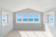217 Salter Path Road, Pine Knoll Shores, NC 28512 — 4-bedroom waterfront home in Pine Knoll Association, Pine Knoll Shores, NC, photo 7 of 62: Third Floor Loft