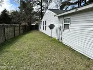 1003 Brynn Marr Road, Jacksonville, NC 28546 — 4-bedroom home in Brynn Marr, Jacksonville, NC, photo 21 of 21: SIDEYARD