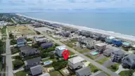 4312 E Dolphin Drive, Oak Island, NC 28465 — waterfront lot in Long Beach, Oak Island, NC, photo 5 of 7: Aerial photos-5