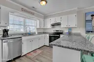 603 N Anderson Boulevard, Topsail Beach, NC 28445 — 4-bedroom waterfront home in Topsail Beach, Topsail Beach, NC, photo 20 of 35: IMG_4064