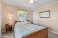 411 5th Street, Sunset Beach, NC 28468 — 4-bedroom home, Sunset Beach, NC, photo 19 of 50: Front Bedroom 1