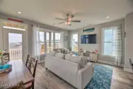 124 Salt Marsh Way, Atlantic Beach, NC 28512 — 4-bedroom waterfront home in Salt Marsh Villas, Atlantic Beach, NC, photo 2 of 32: Pink4