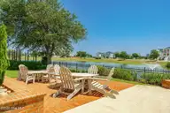 233 Cumberland Street, Newport, NC 28570 — 3-bedroom home in Cannonsgate, Newport, NC, photo 17 of 17: Neighborhood Pond Seating