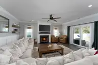 541 Moss Lake Lane, Holly Ridge, NC 28445 — 4-bedroom home in Summerhouse On Everett Bay, Holly Ridge, NC, photo 19 of 71: living-room-01b